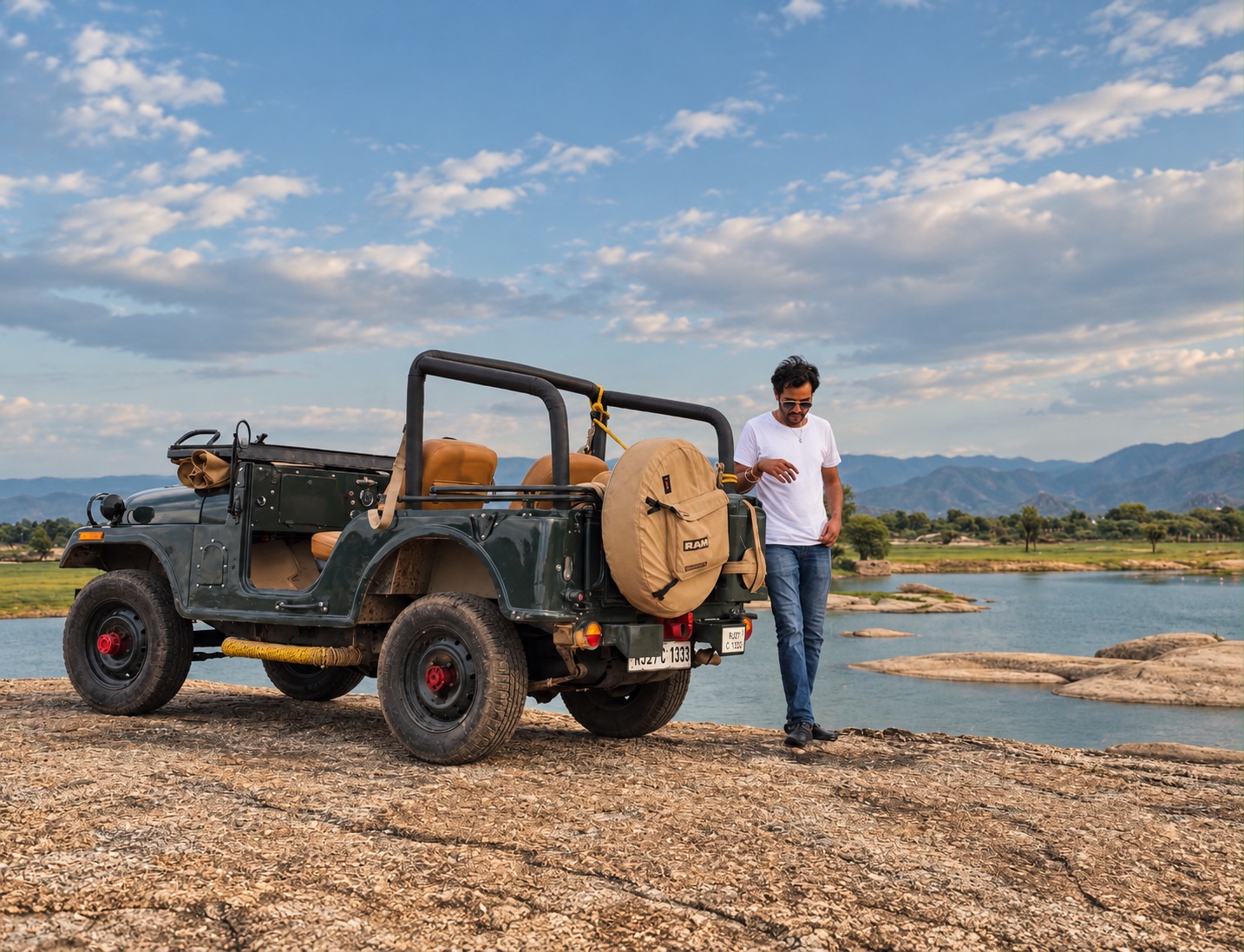 Ranakpur safari — jeep on the riverbed below the Aravallis